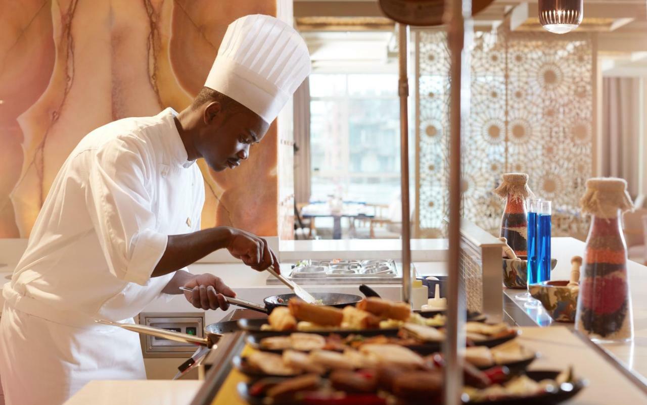 Hotel Tilal Jabal Al Kabah Mekka Exterior foto A chef at work